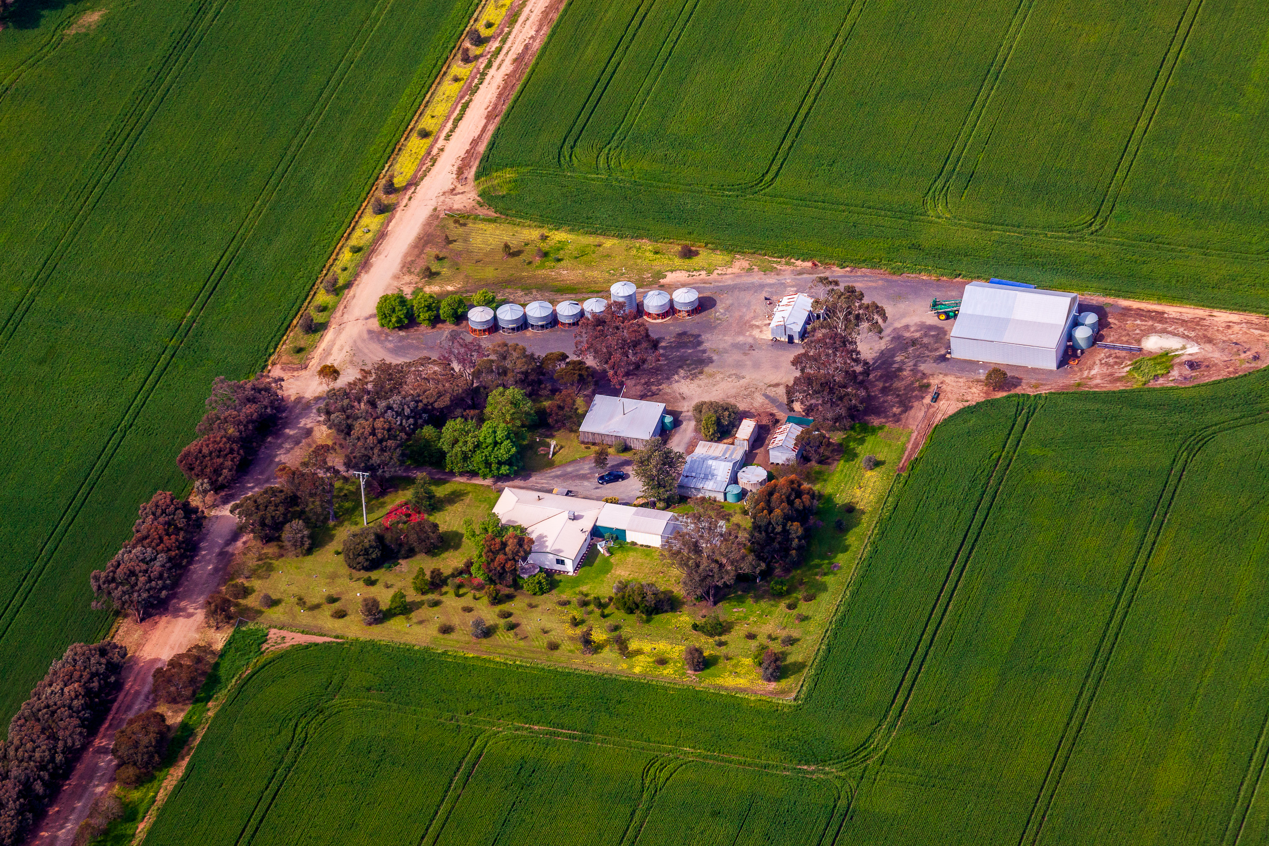 Aerial photograph of rural Victoria property with windbreaks, stock laneways and irrigation channels