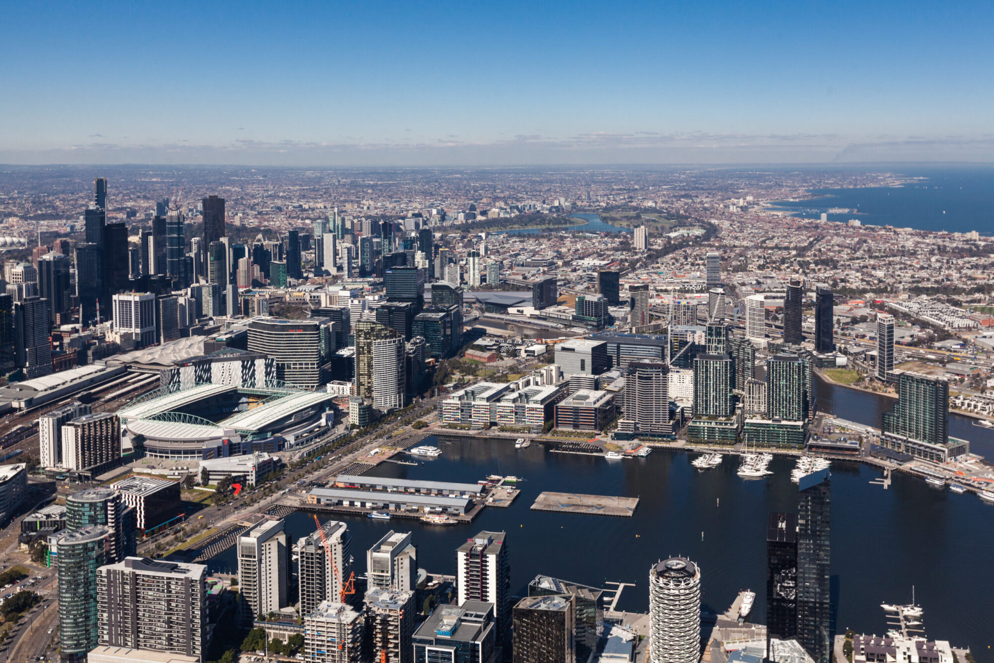 Helicopter aerial photography Melbourne Docklands CBD skyline from above