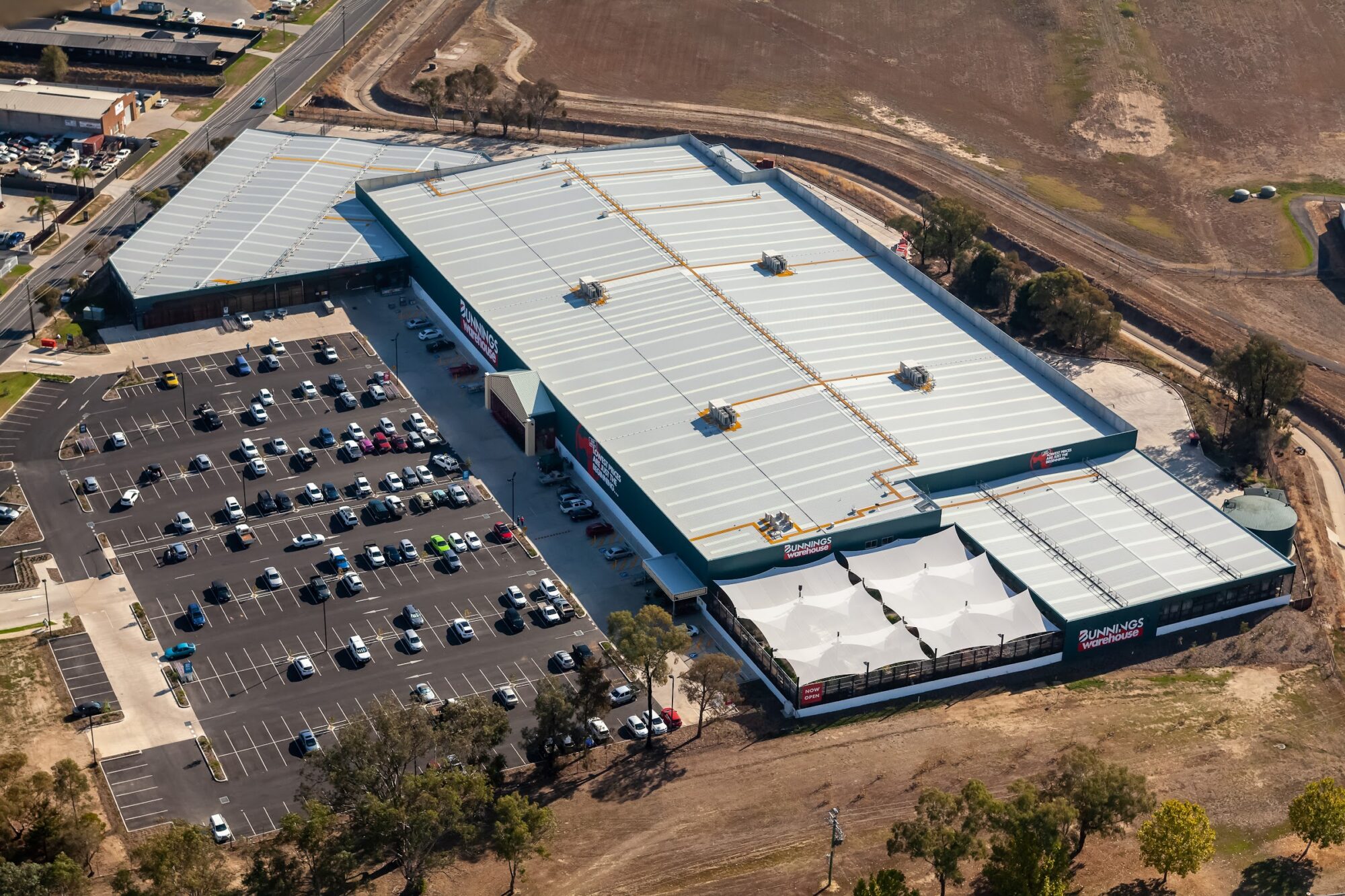 Near vertical top down aerial photograph of Albury Warehouse roof and full carpark