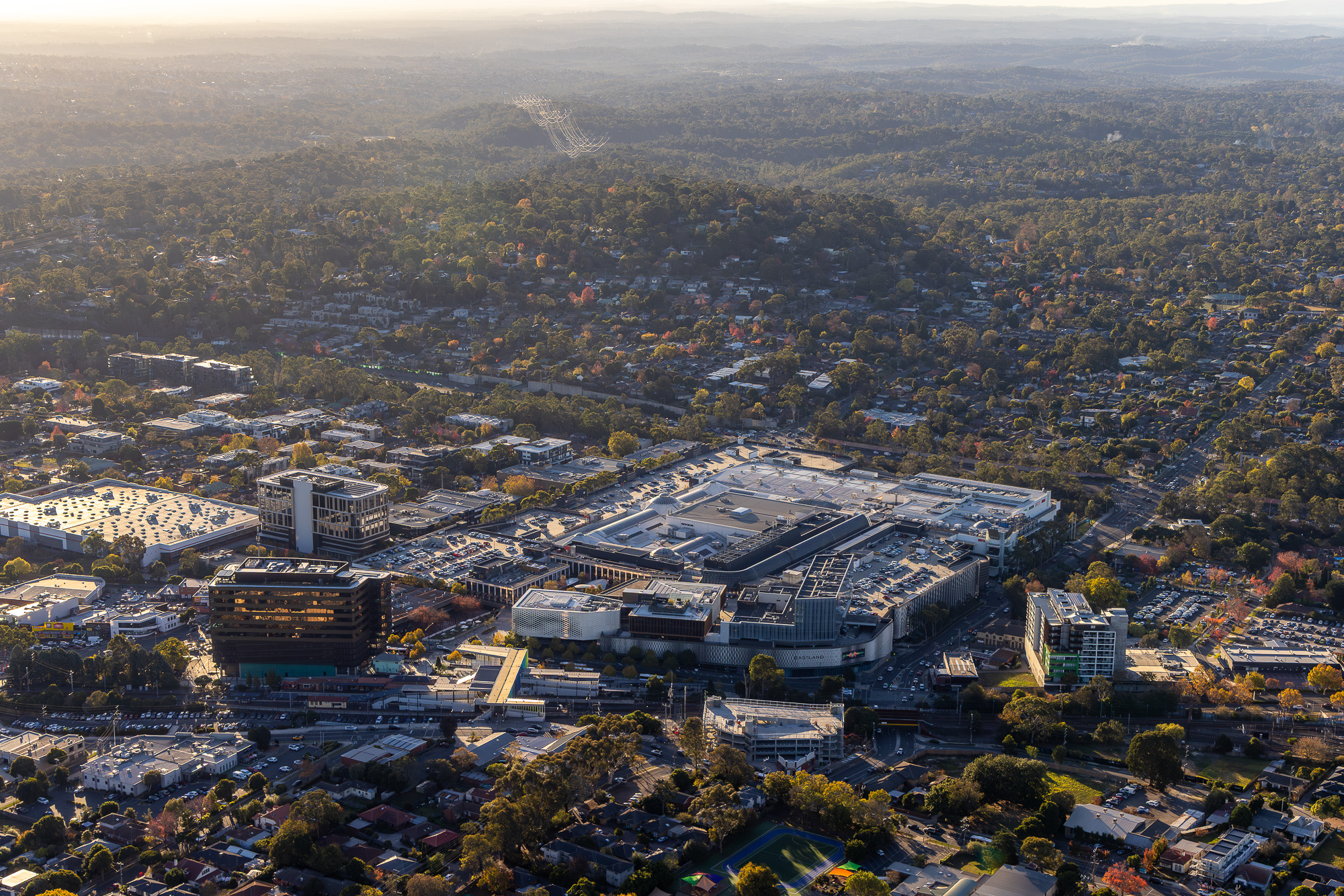 Aerial photography of Eastland Shopping Centre, Ringwood Melbourne — drone photograph showing rooftop and surrounding development