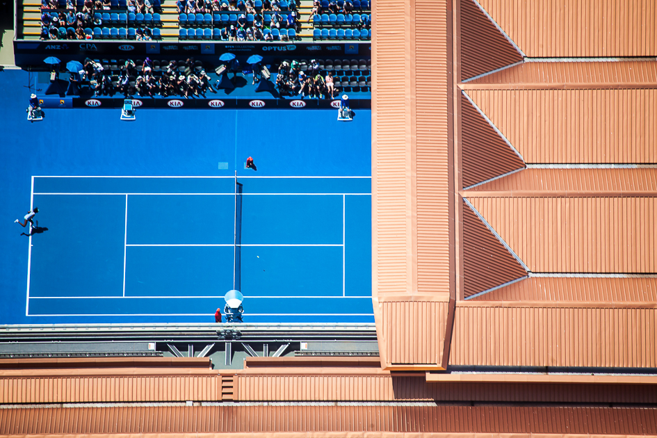 Aerial photograph of Margaret Court Arena during the Australian Open showing the tennis court, crowd and stadium roof structure