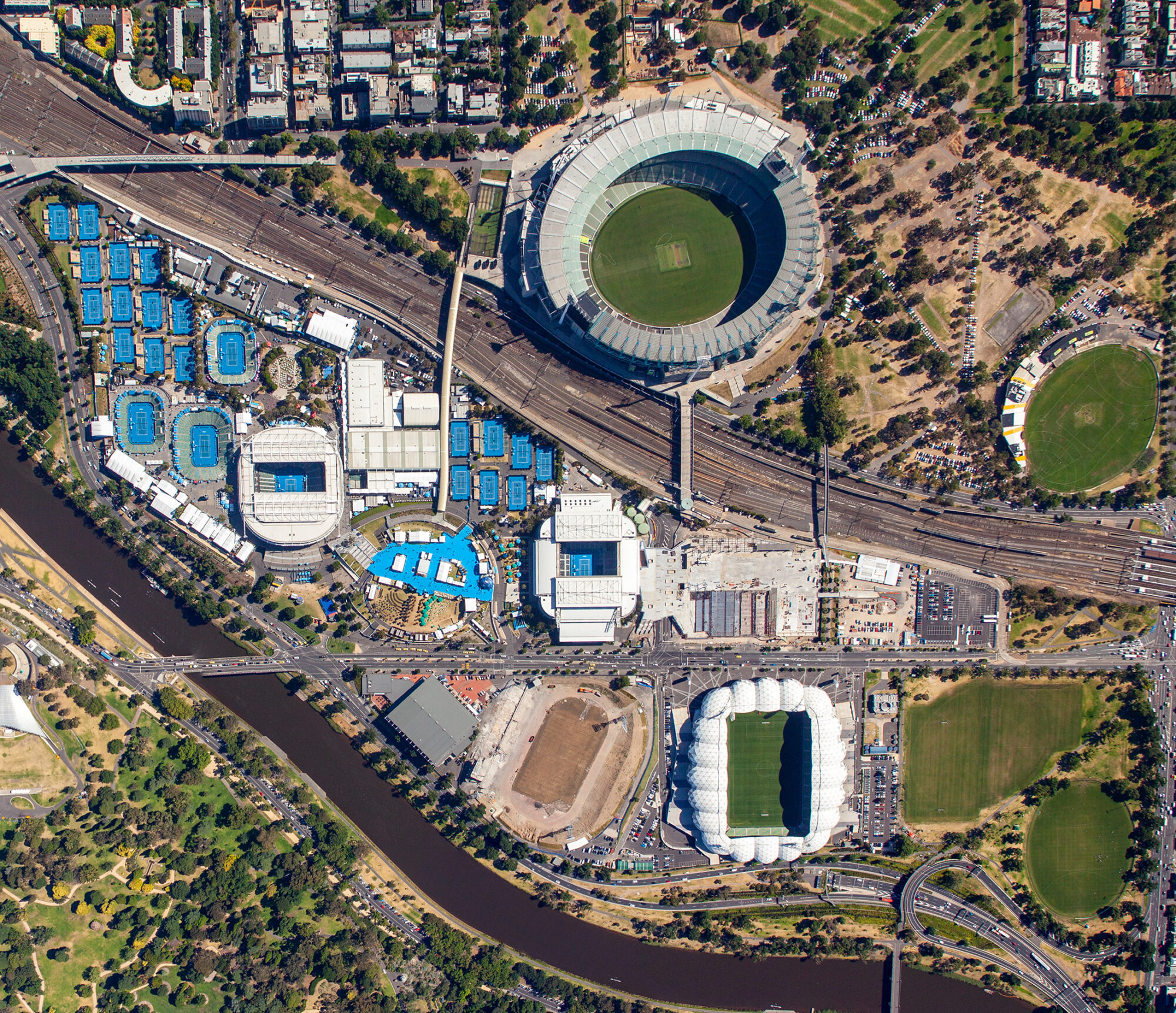 Vertical aerial photograph of Melbourne and Olympic Parks precinct in 2012 showing Rod Laver Arena, tennis courts and surrounding venues