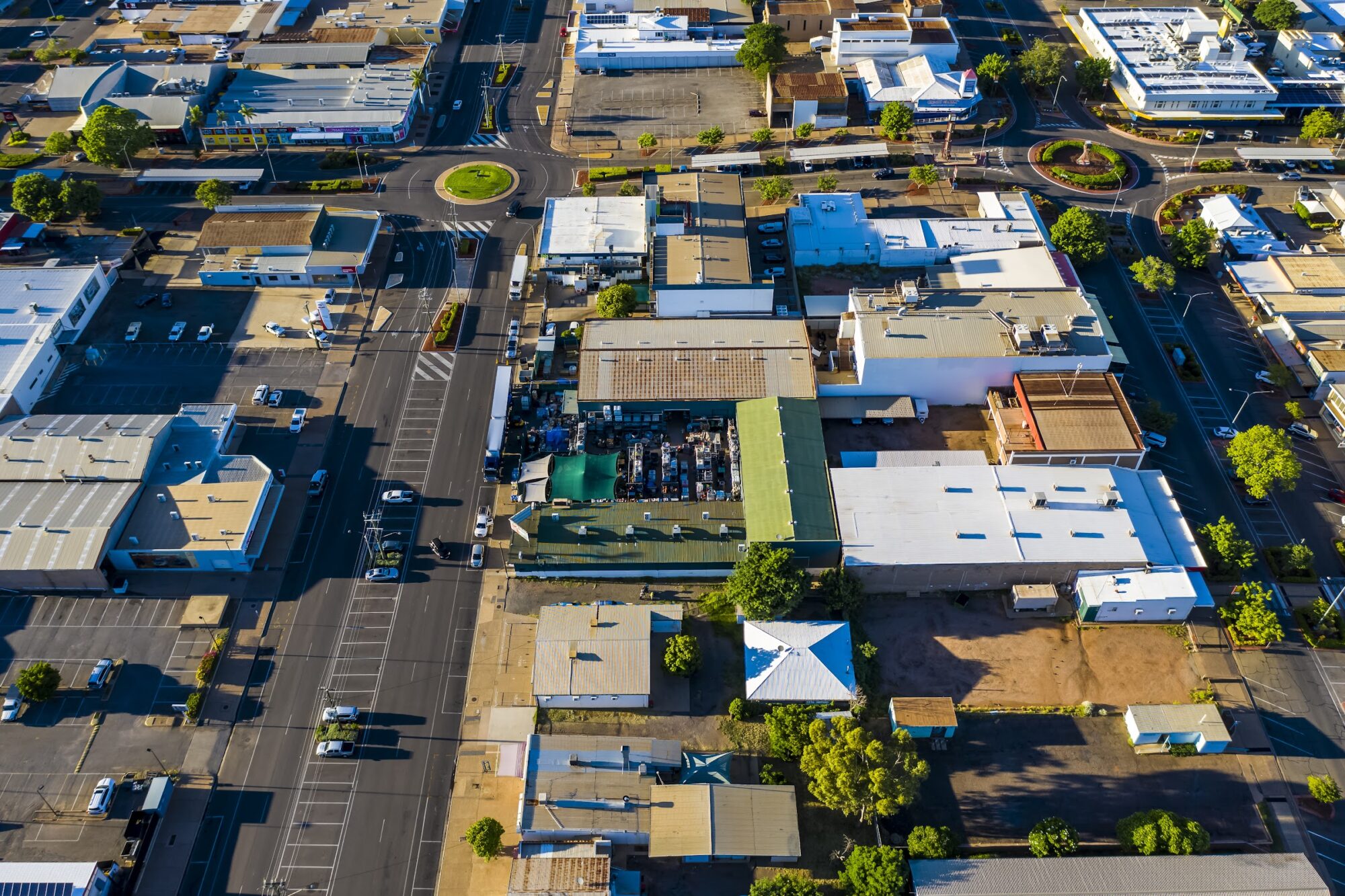 Golden hour aerial photograph of Mount Isa Warehouse showing the town grid and roundabouts in remote north west Queensland